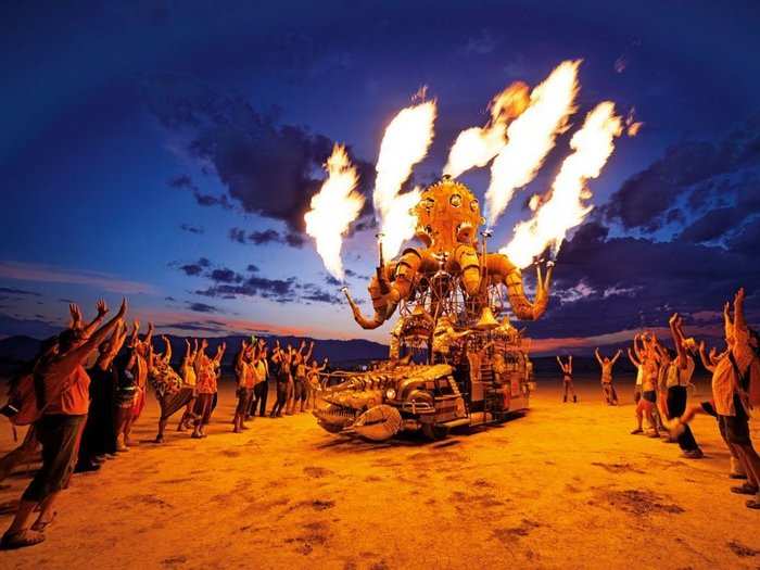 "El Pulpo Mecanico," an enormous octopus made from scrap metal in 2014, shoots off flames to the delight of bystanders.