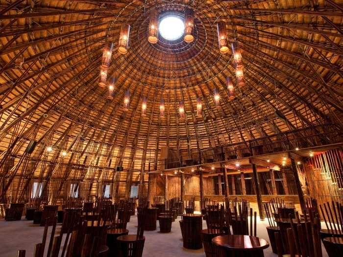 This stunning bamboo dome is about an hour from Saigon. Despite sitting in the middle of an artificial lake, the Water and Wind Café itself is made entirely of natural materials — even the furniture is bamboo. The 32 foot high bamboo and bush covered structure was also built without a single nail, instead using traditional Vietnamese weaving techniques.