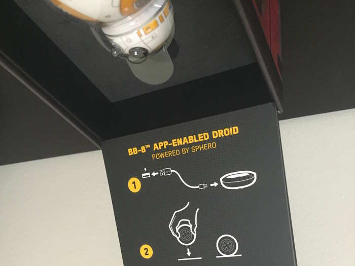 The removable Sphero card lifts up to reveal a set of instructions for charging the droid along with where to get the app to control BB-8.