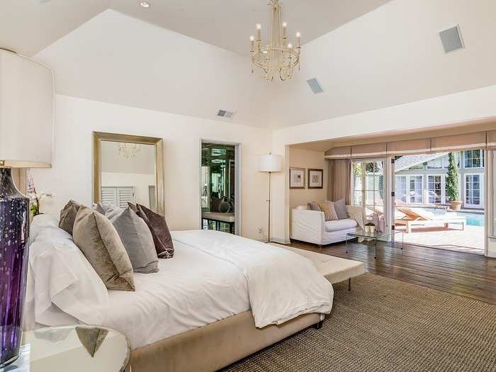 The master bedroom has wide French doors.