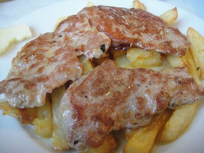 Solomillo al whisky is popular in Seville and typically consists of pork medallions marinated in whiskey or brandy and fried in olive oil.