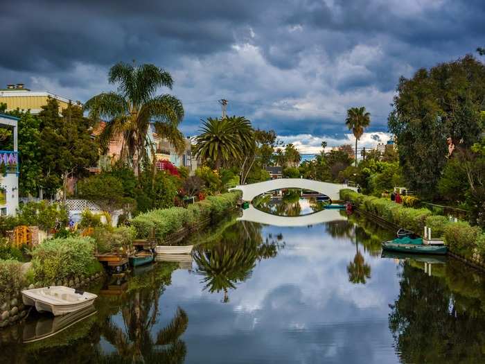 Walk through the serene Venice canals on your way to Venice Beach.