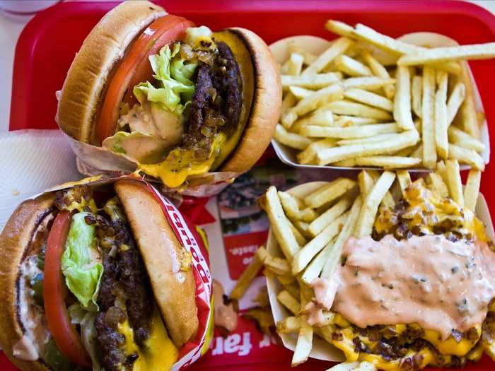 Taste a burger and Animal Style Fries—made fresh and smothered in thousand island sauce, grilled onions, and cheddar cheese—from In-N-Out Burger.