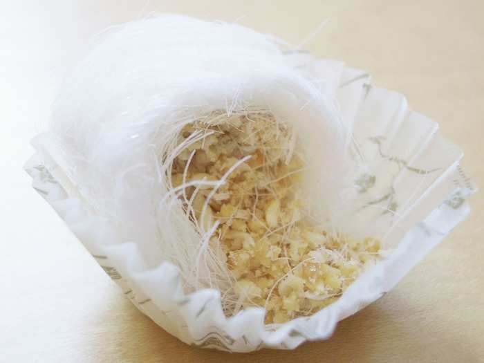 Dragon beard candy is not only a Chinese dessert, but also a handmade traditional art of the country. Resembling a white cocoon, dragon beard candy is made mainly from sugar and maltose syrup, along with peanuts, sesame seeds, and coconut.