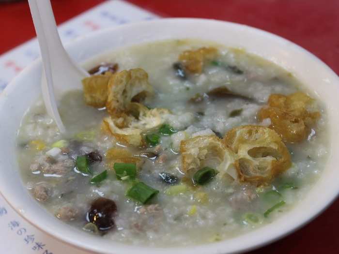 A cross between rice porridge and soup, congee is prepared by cooking grains in water, which then creates a kind of thick soup. Congee can be served with everything from chicken to pork to small fried donuts for dipping.