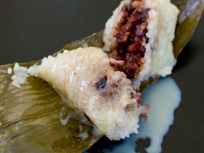 Found all over the country, zongzi are little pockets made from bamboo leaves and filled with glutinous sticky rice that