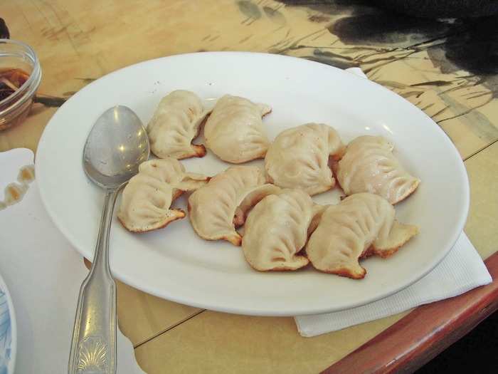 Known as pot stickers in English, guo tie are a sort of cross between two common Chinese foods: dumpling and fried bun. The little pockets of dough can be filled with anything from shrimp to pork to beef, which is then paired with cabbage, ginger, and onion.