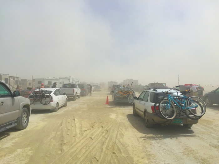 But Burning Man officially begins three hours from Reno at the gates of Black Rock City, where vehicles wait in lines of traffic before they can be admitted.