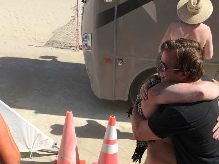 Once you reach the entrance — which can take anywhere from 10 minutes to 10 hours depending on weather and traffic — burn "virgins" are hugged by a nude welcoming committee.