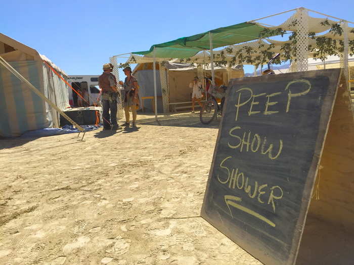 Another camp offered a "Peep Show Shower." Running water can be hard to come by.