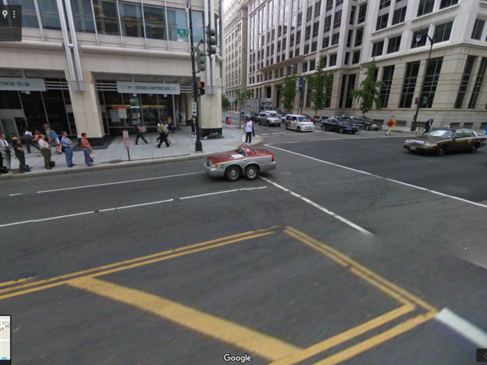 This shot makes it look like people are lined up to see the smallest car in the world in Washington DC. It