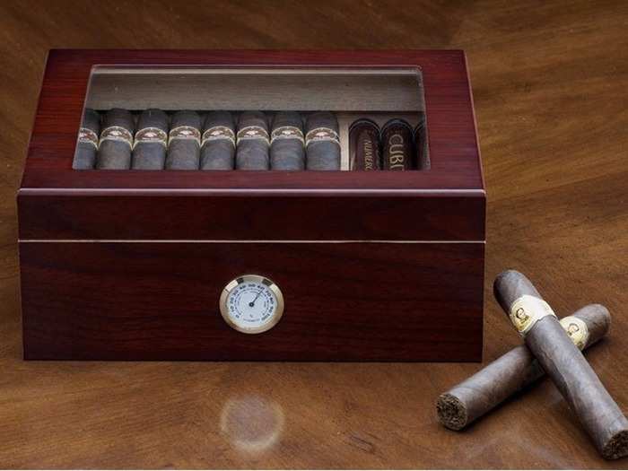 This cigar humidor will keep cigars organized and fresh.