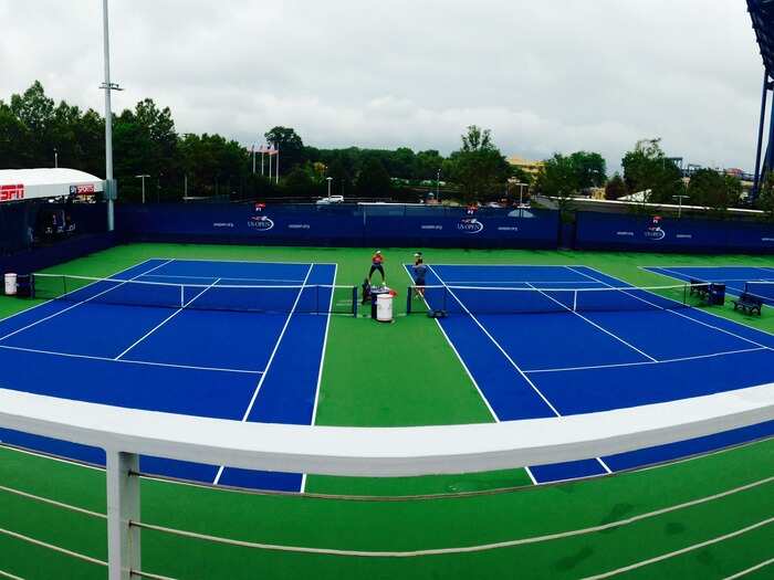 Matches were still delayed due to inclement weather when I arrived, and the practice courts were bare. There was only one other woman in the stands, meaning I had my choice of seats in a gallery that is normally packed.