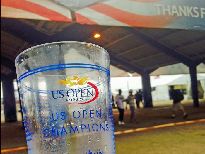 The sky looked too ominous to hang around, so I took my cup and headed out. I left at the right time — the rain came soon after and all night matches had to be rescheduled.