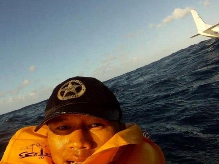 Ferdinand Puentes had his GoPro video camera rolling when a small plane he was in crashed into the ocean. Deciding to leave the camera rolling, he flipped the device around, capturing this selfie with the sinking plane in the background.