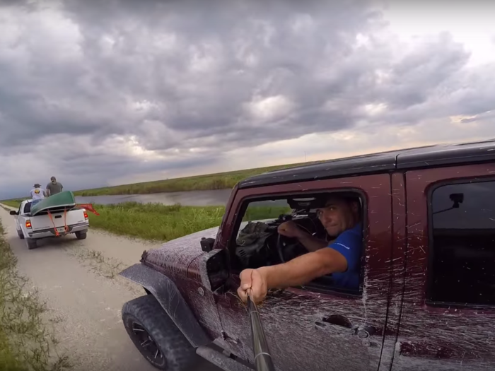 Alex Lopatnyuk was gator hunting in Florida and brought along a GoPro for the first time. He decided to get a selfie of himself driving — but wasn