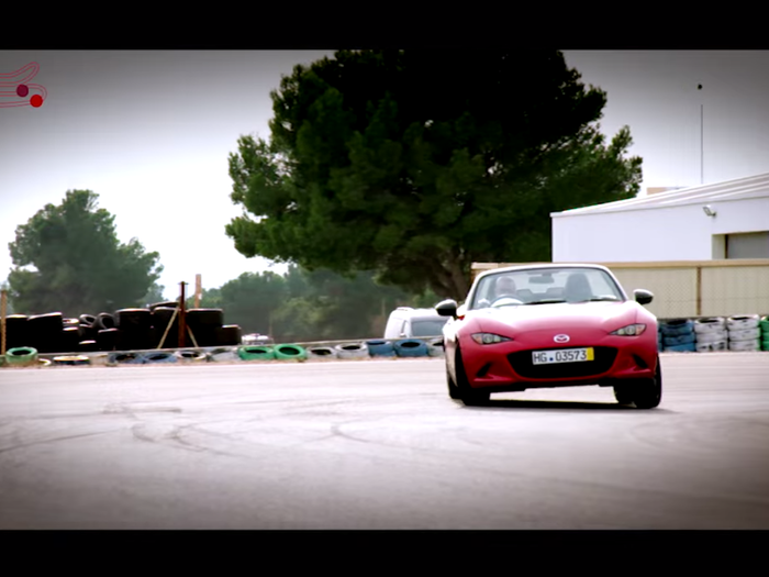 The 2015 MX-5 can handle these hard corners. Look at how Mildenhall is leaning into that turn.