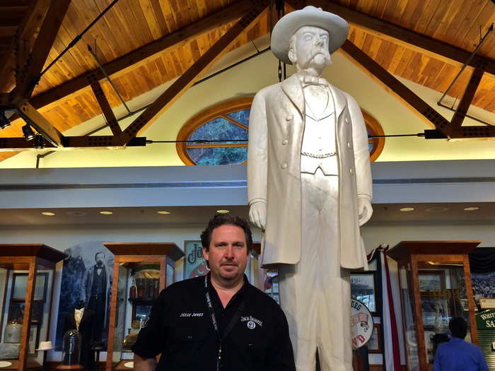 Our friendly Southern tour guide meets us by this statue of Jack Daniel in the center of the visitor center. His name really is Jesse James.