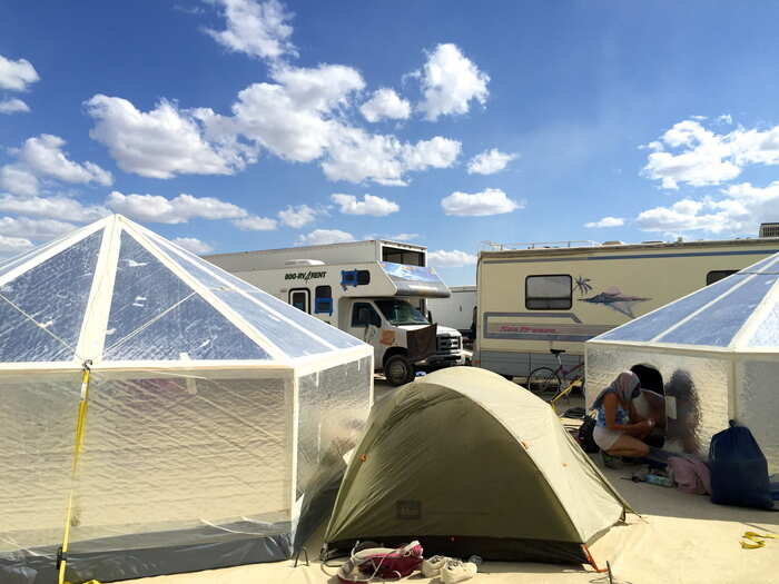 But most camps are made up of older tents, yurts, and RVs.