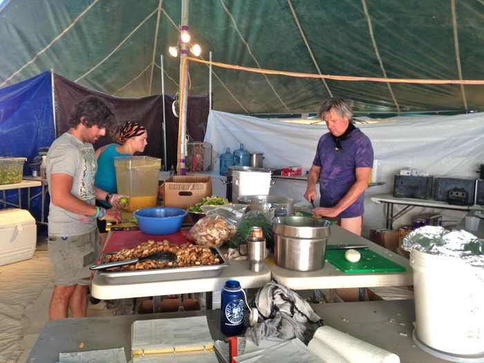 At a larger camp responsible for feeding hundreds of people, entire tents are set up as a kitchen area.