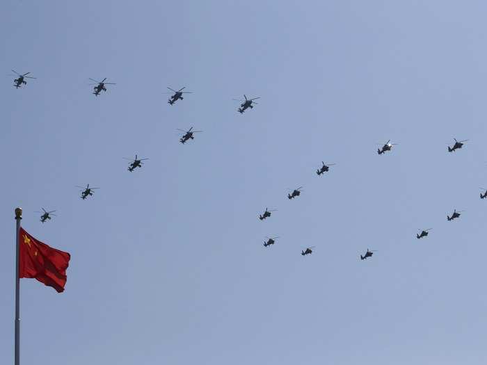 Chinese officials also restricted vehicles to drive every other day. The good air quality lasted for 15 days up until the festival, so that aerial stunts like this "70" made of military helicopters could be visible.