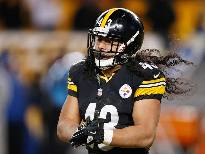 Which body part did former NFL player Troy Polamalu have insured in 2010?