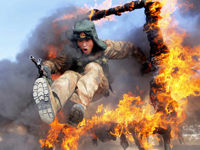 In China, jumping through a ring of fire is just part of training.