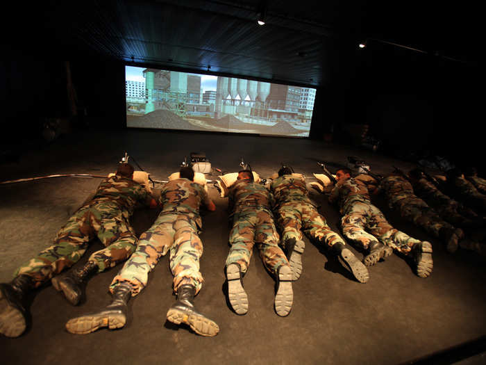 But military training is not always so daring. These Lebanese soldiers use a virtual-reality game to practice their shooting skills without the risk of getting injured.