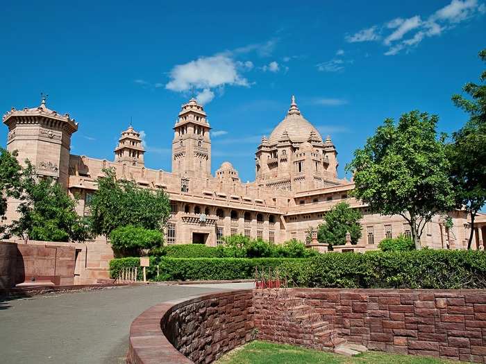 Both a luxury hotel and the residence of the royal family of Jodhpur, the Umaid Bhawwan Palace sits on 26 acres and is made completely of sandstone, giving it a unique look.