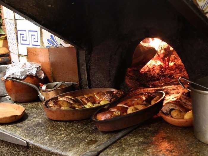 Both the lambs and pigs are roasted in the nearly 300-year-old original wood-fired oven made of cast iron.