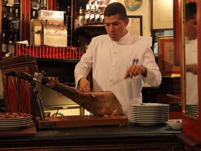 Luscious Ibérico ham is cut to order.