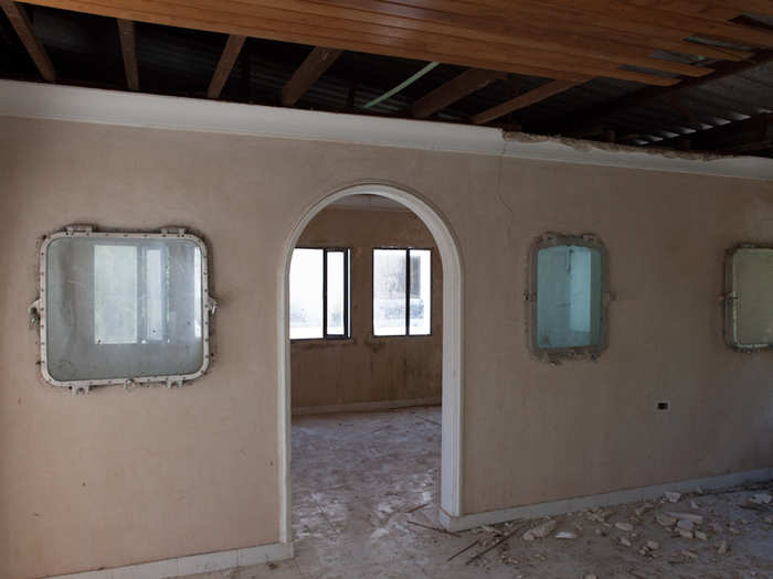 Some of the windows in the villa appear to be reinforced.