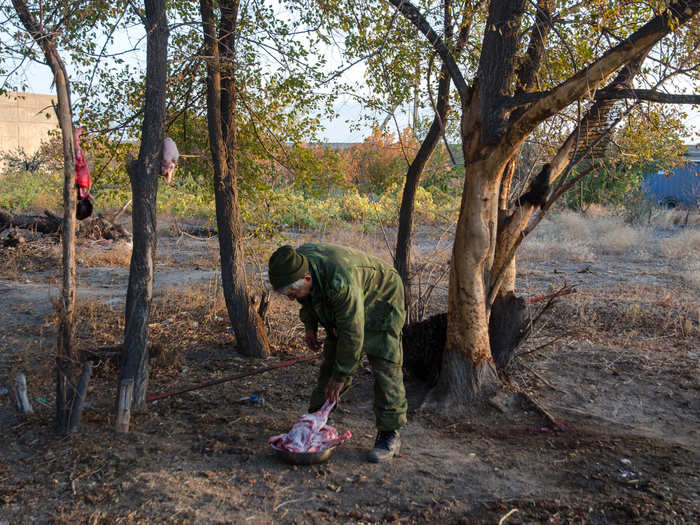 Gandy accidentally wandered onto an onion plantation where this man was butchering a sheep. He and his family treated Gandy to a lamb dinner with tea and vodka, telling him tales of hunting on the steppes.