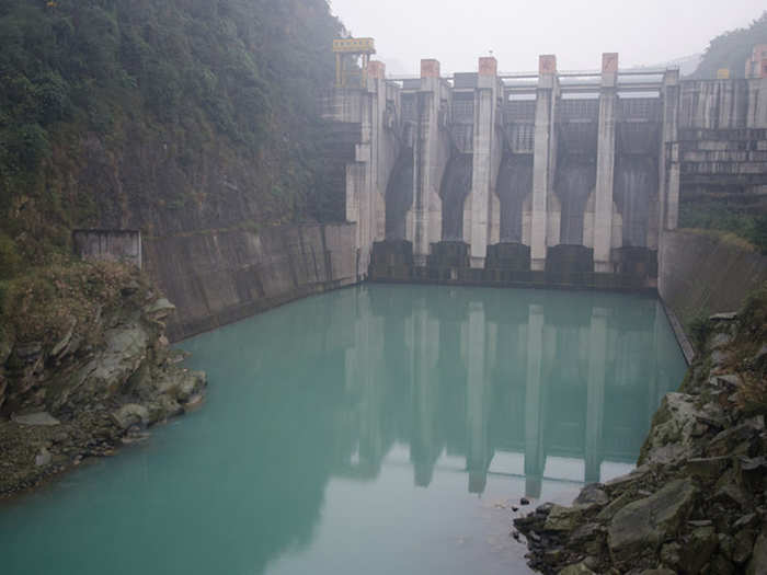 "The number of people, the language barrier, busy roads, and the economic revolution which has destroyed so much of their natural heritage make [China] the most difficult country I