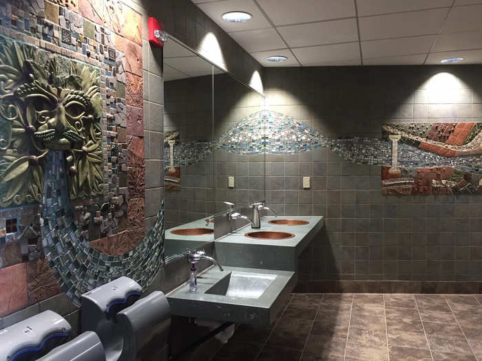 HAMILTON, OH: Cincinnati artist Jan Brown Checco hand-crafted the tiles for this restroom in the Fitton Center for Creative Arts. Pottery students from the Fitton Center also contributed.