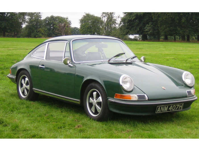 The original 911 entered production in 1963 as a more usable and refined alternative to the 356. The round headlamps and distinctive profile are readily apparent. The five spoke Fuch