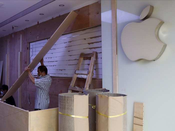 Many of them have been kitted out to look exactly like real Apple stores. The sales staff wear blue T-shirts with a white Apple logo, and display iPads, iPhones and Apple Watches on the same wooden tables you