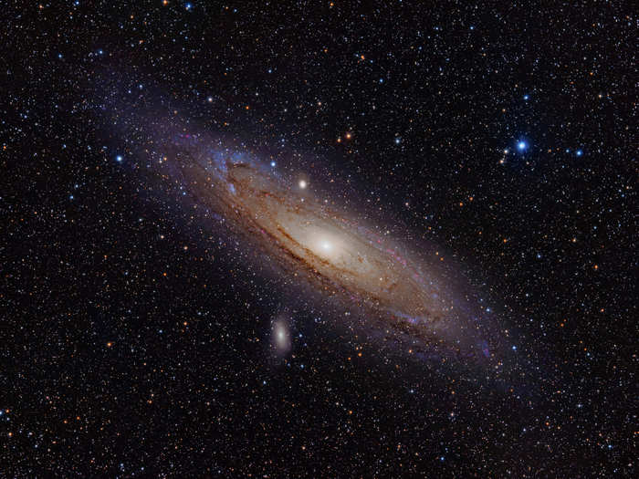 Both our home galaxy, the Milky Way, and the Andromeda Galaxy are spiral galaxies, named for the way their arms spiral out from their centers. At a distance of 2.5 million light-years away, the Andromeda Galaxy is the closest spiral galaxy to us.