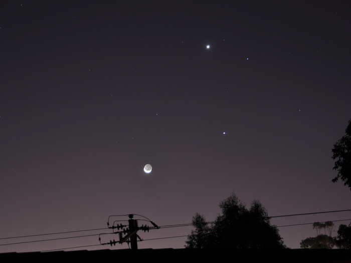 Last June, there was a Venus-Jupiter conjunction where both planets appeared to pass extremely close to one another in the night sky. In the photo below you can see the brighter Venus at the top, Jupiter just below, and then the moon to the bottom and left of center. Now that you know where to spot some planets, stars, and even a galaxy, we wish you happy observing!