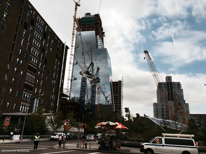 The 33rd Street entrance is in the shadow of 10 Hudson Yards, the first skyscraper of the development plan. The tower will hold the new headquarters of Coach Inc. and is on track to open in late 2015.