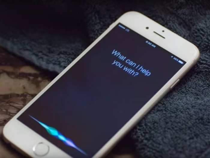 You can use Siri completely hands free even when your iPhone isn