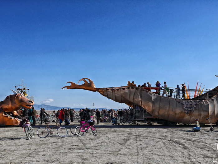 Structures like this dragon car are known as "art cars" or "mutant vehicles."