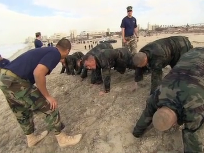 Sailors run a quick 2 miles to the beach and spend the next six hours completing brutal workouts in the sand.