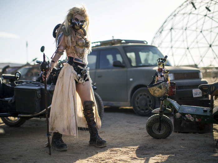 The crowd ranges from car builders to cosplayers like Desirae Hep, who makes for an intimidating "Immortan Joe."