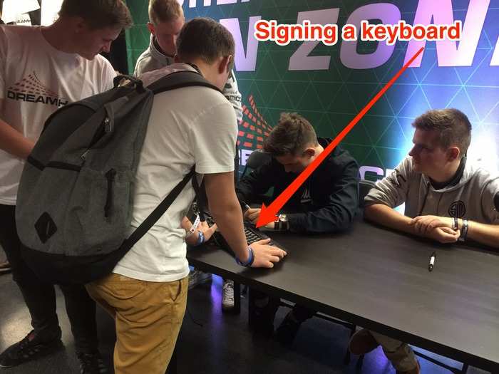 There were also a lot of people who brought their own keyboards to be signed by the professional gamers.