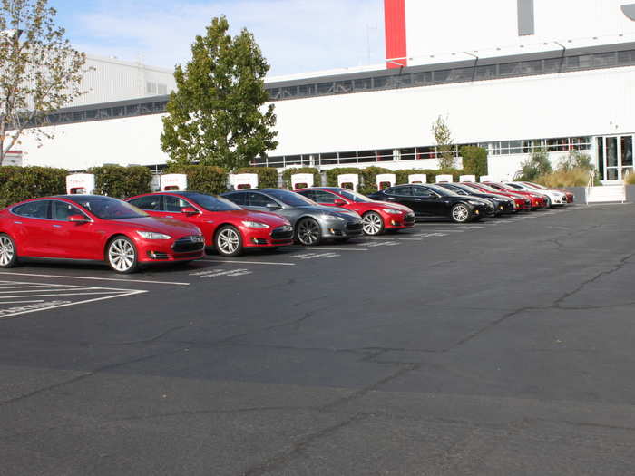 As we pull up to the Tesla Factory, we are greeted by a row of the company