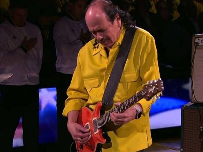 Guitarist Carlos Santana wears a £599 stainless steel Apple Watch on a Milanese Loop strap.