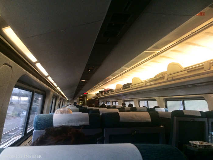 Plus, coach is considerably less expensive than business class and much less costly than the Acela high–speed train. This is the coach experience: one aisle, two seats on each side, similar to the average economy class flight.