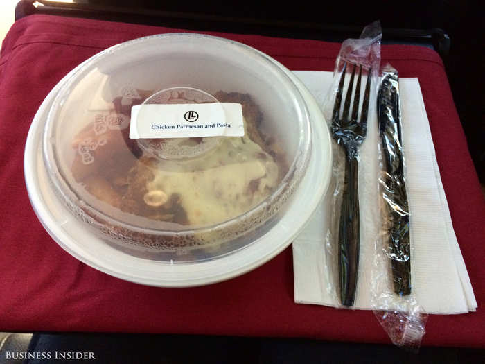 A complimentary meal is served on a red place mat. I chose a chicken parmesan and pasta dish. The other option was a grilled chicken salad. There are also vegetarian options, which you should note when you order your ticket.
