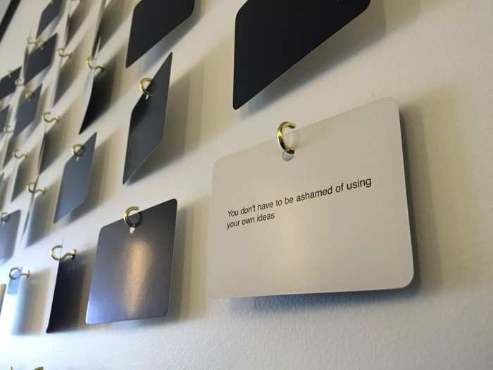 There are all kinds of other musical and movie easter eggs hidden around the building. This piece, "Oblique Strategies," was created in 1975 by legendary record producer Brian Eno and artist Peter Schmidt. Each of the black cards has an aphorism on it designed to help break through creative dry spells.